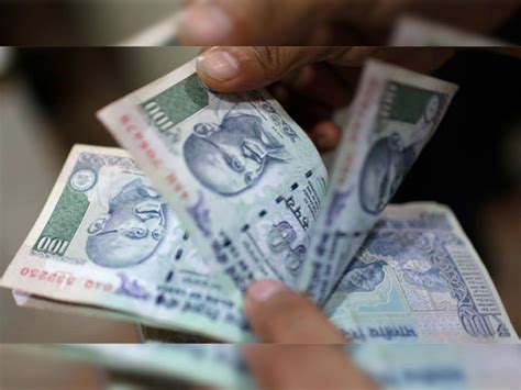 Rupee recovers from record low, ends at 72.19 against dollar