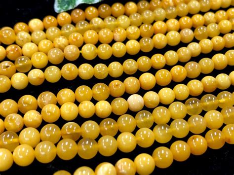 圧縮加工無し★バルト海産★天然琥珀★蜂蜜色★天然石ビーズ/ハニーアンバー（蜜蝋アンバー/amber/琥珀・こはく）/ラウンド/約5mm/1連 ...