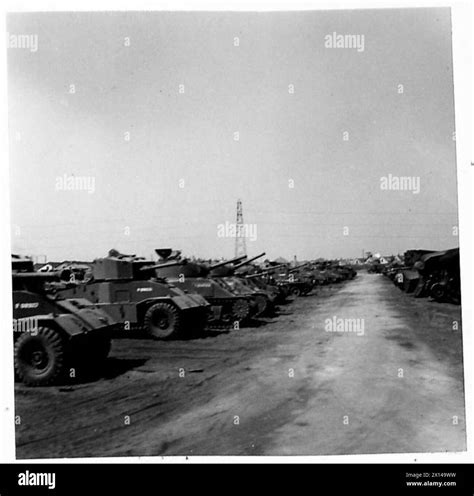 Sherman tanks of Slough No. 6 M.T. Group are deployed by the British ...