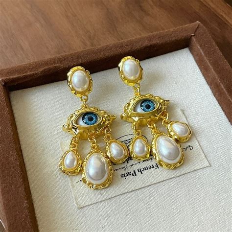Bling of Eye Earrings – Jewelsmars