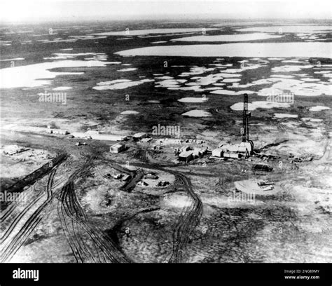** FILE ** This 1968 aerial view shows one of the first oil wells in ...