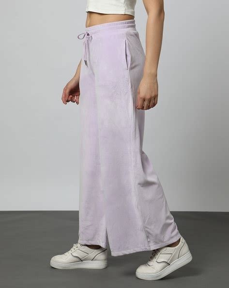 Buy Lilac Track Pants for Women by Outryt Sport by AZORTE Online | Ajio.com