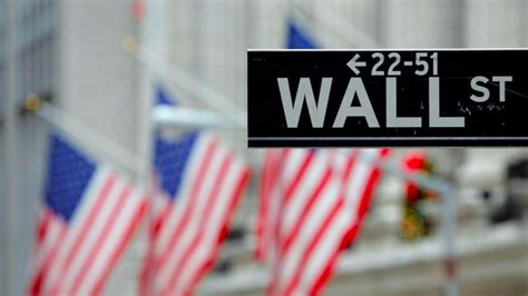 Wall St: S&P, Nasdaq hit record highs after Powell nomination; Dow ...