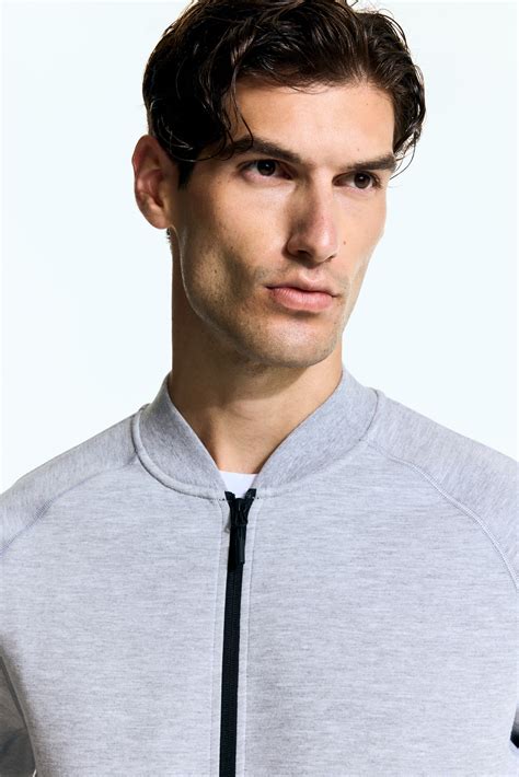 Sports bomber jacket with DryMove™ - Light grey marl - Men | H&M IN