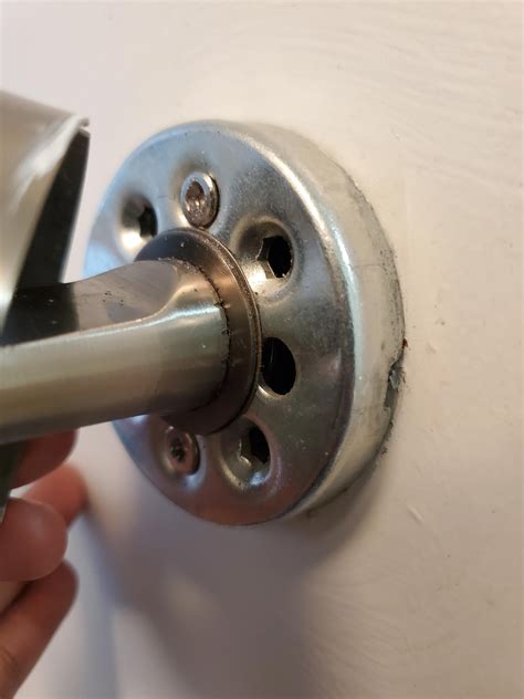 How to uninstall this contemporary door handle : r/fixit