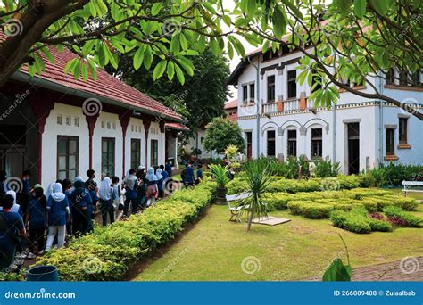 The Atmosphere of a Student Tour Group Together with a Tour Guide Looks at the History of the ...