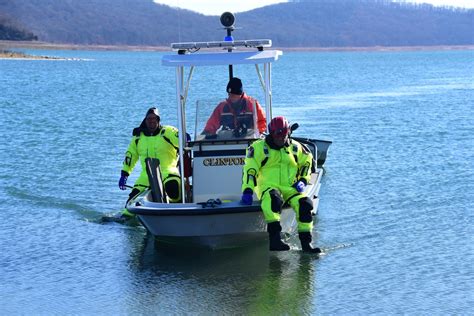 2 boaters rescued by first responders after capsizing at the Round ...