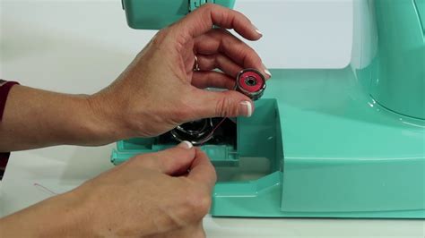 Image result for Threading Bobbin On Singer Simple