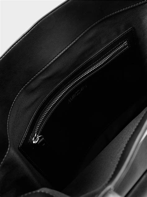 Shoulder bag with decorative fringes | marc-cain.com/en