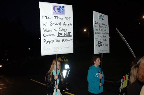 Students speak out against gender violence at Take Back the Night ...