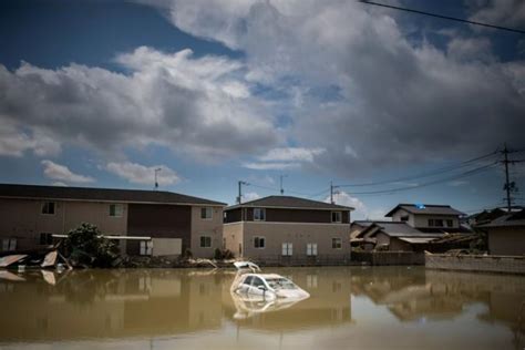 Japan floods: Death toll over 200 as survivors grapple with scorching ...
