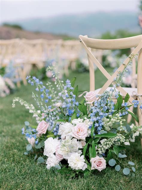 May White, Blush, and Blue Ranch Wedding Ceremony Aisle Flowers