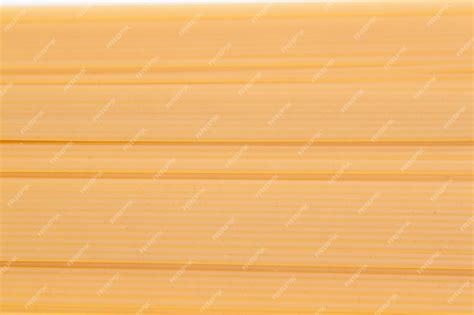 Premium Photo | Background of spaghetti durum wheat it occupies the ...