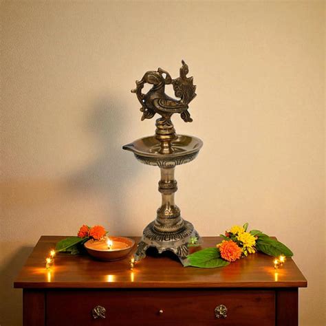 Aakrati Annapakshi Nilavilakku Handmade lamp - Diya for Pooja | – Ashopi