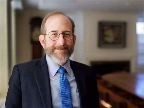 Who is the economist-doctor-marathoner leading Harvard and rising as a ...