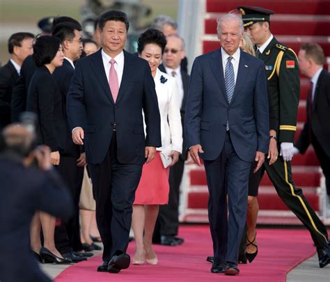 Biden, Xi try to tamp down tension in long virtual meeting