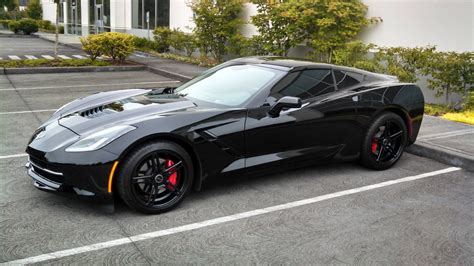 Black Corvette Stingray in American Parking Lot