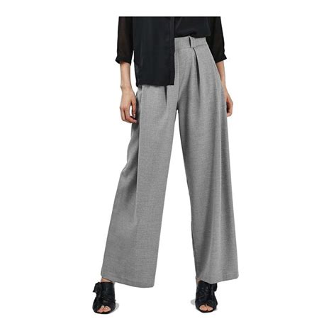 Mira Rajput Kapoor in white shirt and wide-legged pants with Misha ...