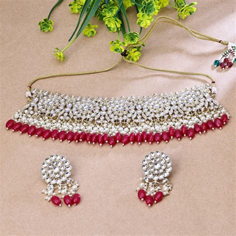 Sukkhi Intriguing Pink And Golden Austrian Stone Gold Plated Tradition ...