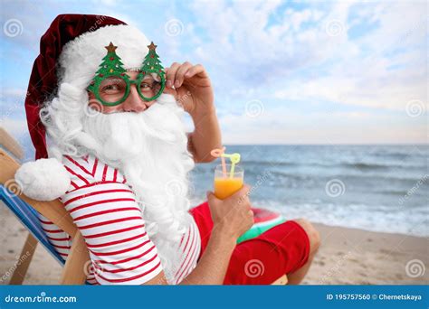 Santa Claus in Party Glasses with Cocktail Relaxing on Beach. Christmas ...