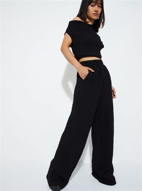 Buy ALAYA F x URB_N Women Textured Wide Leg Trousers Online at just Rs ...