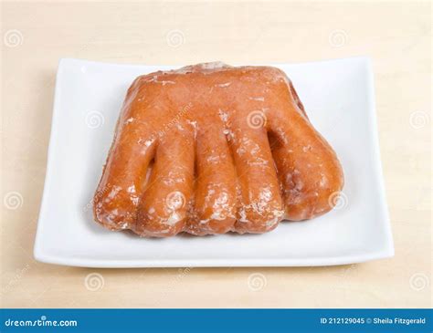 One Bear Claw Donut on Rectangular Plate Stock Image - Image of food ...