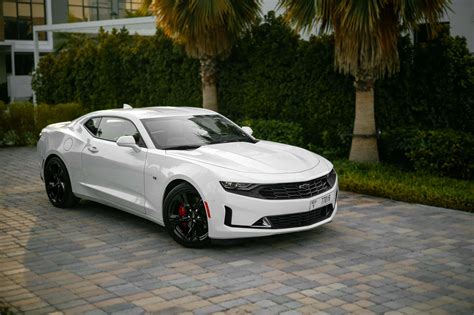 Rent Chevrolet Camaro White in Dubai - Coupe - Octane.Rent