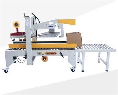 Strapping Machine - Semi Auto Flaps Folding Carton Sealer Service ...