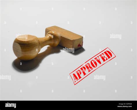 approved rubber stamp isolated on a white background Stock Photo - Alamy