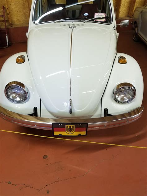 German flag with Coat of Arms on the front license plate of this Volkswagen Beetle : r/vexillology