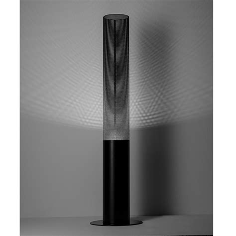 Floor lamp with perforated metal diffuser