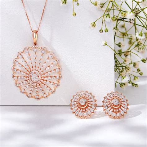 Buy Gleaming Snowflake Design Rose Gold Pendant Set OSP23E49-D400X0B ...