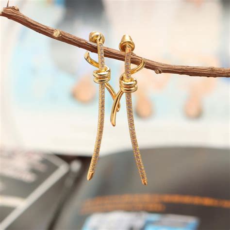 LeCalla - Buy 925 Sterling Silver 18K Gold-Plated CZ Knot Bar Stud ...