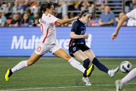 Download Rose Lavelle Soccer Match Action Wallpaper | Wallpapers.com