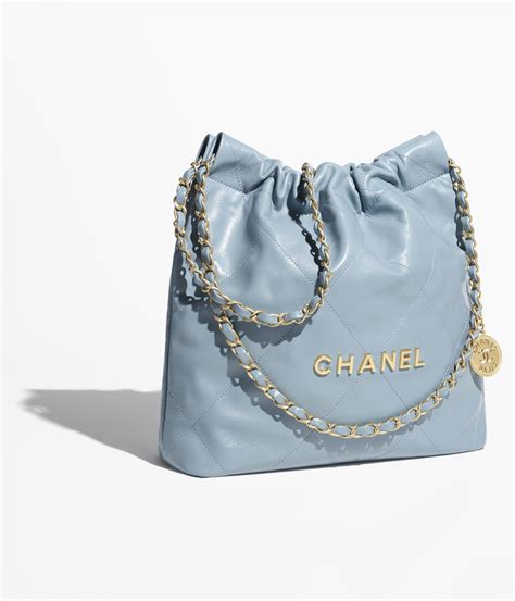 Chanel 22 small handbag, Shiny calfskin & gold-tone metal , blue ...