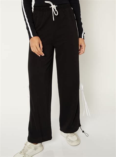 Buy Women Side Striped Track Pants Online at just Rs. 899.0 ...