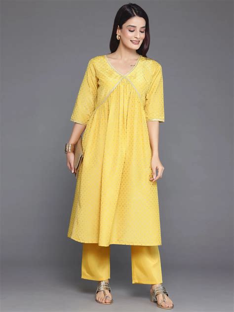 Buy Yellow Woven Design Silk Blend A-Line Kurta With Trousers Online at ...