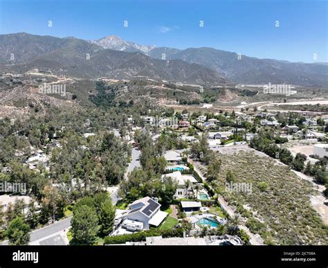 Aerial view of wealthy Alta Loma community and mountain range, Rancho ...