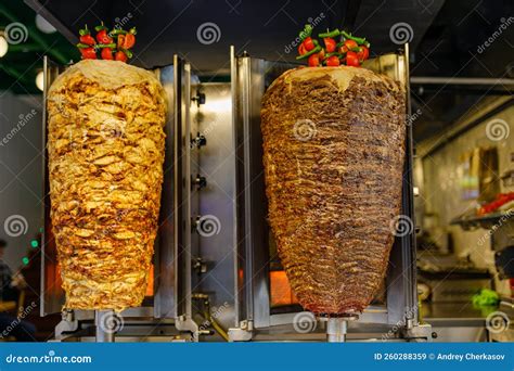 Grilled Chicken Meat on a Vertical Rotisserie Used in Traditional ...