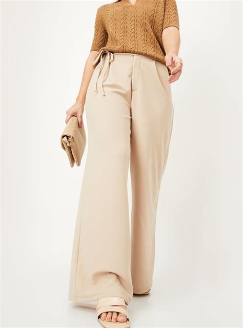Buy Women Textured Wide-Leg Trousers Online at just Rs. 1199.0 ...