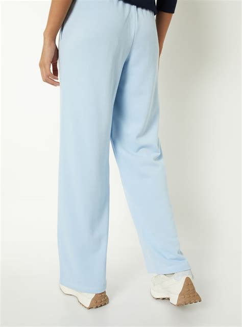 Buy Women Solid Athleisure Track Pants Online at just Rs. 699.0 ...