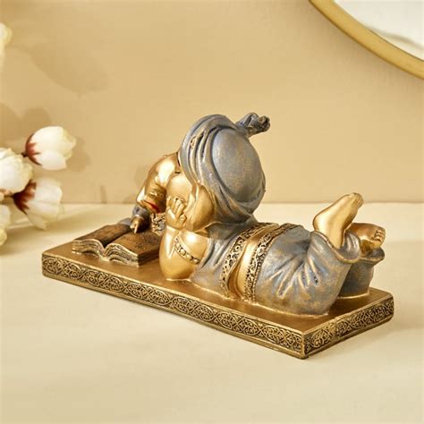 Buy Corsica Fiesta Polyresin Ganesha in Reading Pose Figurine from ...