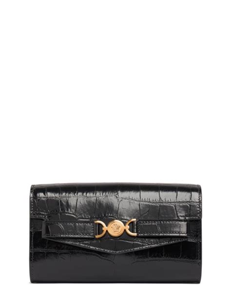 Mini croc embossed leather clutch - Versace - Women | Luisaviaroma