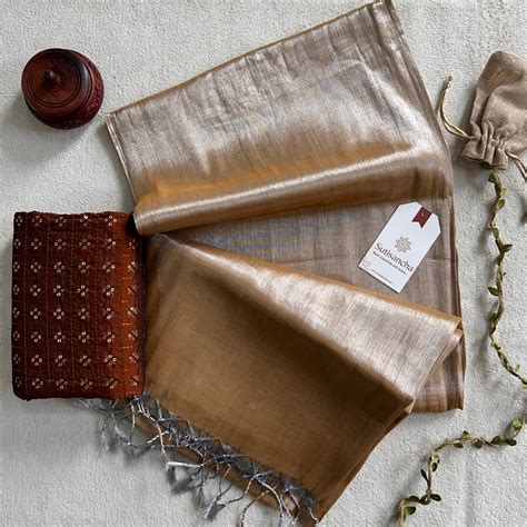 Sutisancha Skeen Handloom Tissue Saree With Designer Blouse