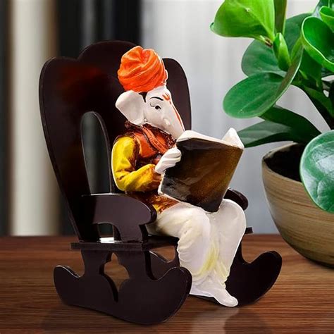 Buy Karigaari India Handcrafted Polyresin Ganesh Idol on Rocking Chair ...