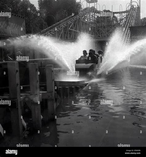 1950s, historical, early water coaster ride, picture shows a family ...