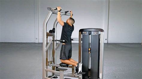 Image result for Assisted Pull Up Machine