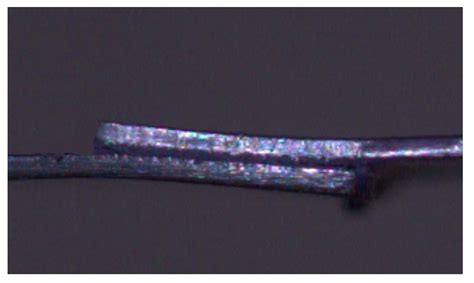 Experimental Study of the Impact of Glass Beads on Adhesive Joint ...