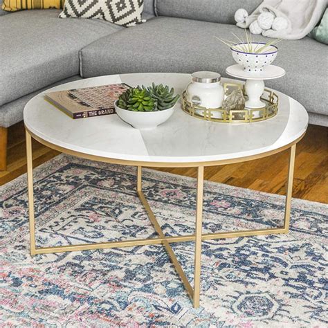 Minimalist Golden Metal Centre Table In Criss Cross Design – Saajawat