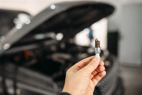Car Replace Spark Plugs Cost [Labor & Parts]
